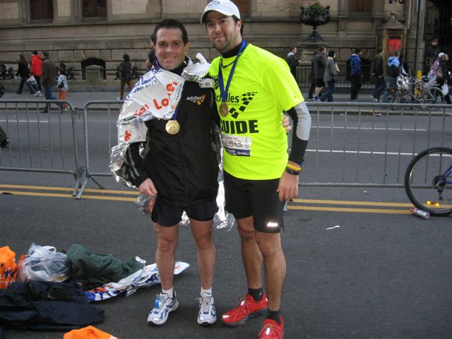 Mike and Drew at finish of NY Marathon 2010 Photo